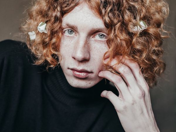 Person standing on a mountain looking at the horizon